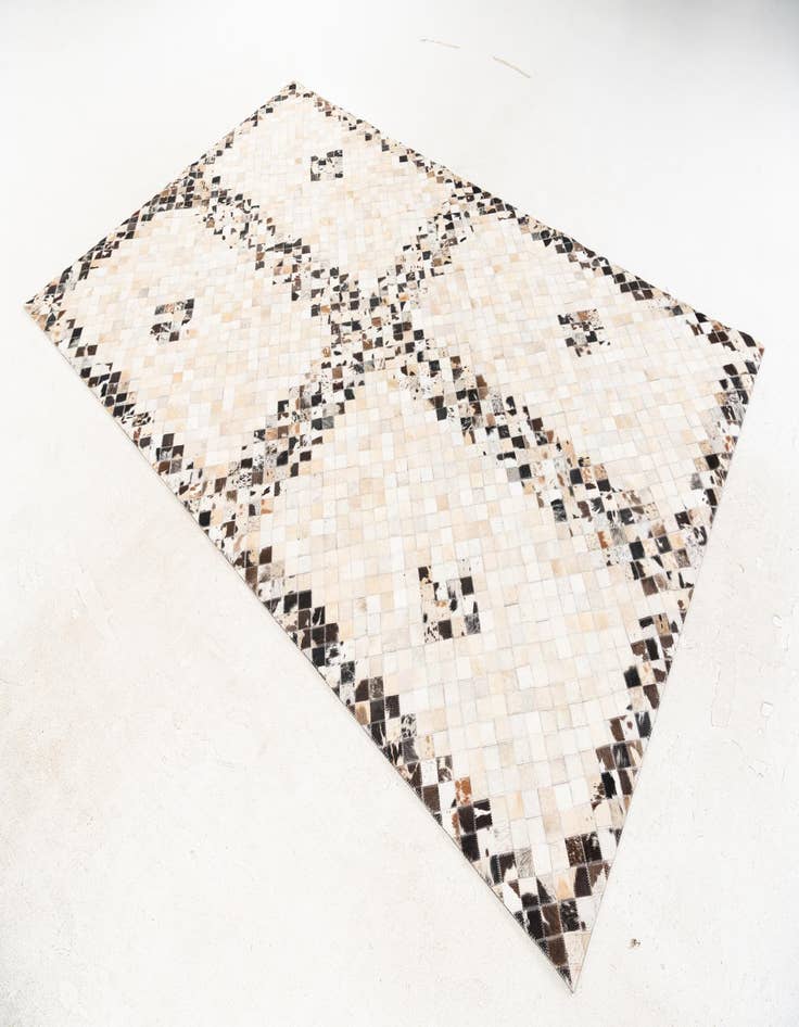 Detail image of  5' x 7' 11 Cowhide Stocks Rug