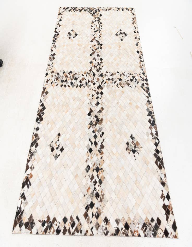 Detail image of  5' x 7' 11 Cowhide Stocks Rug