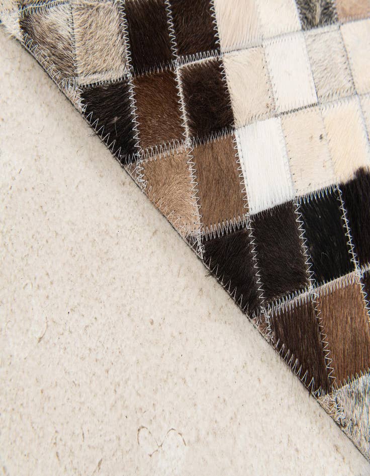 Detail image of  5' x 8' Cowhide Stocks Rug