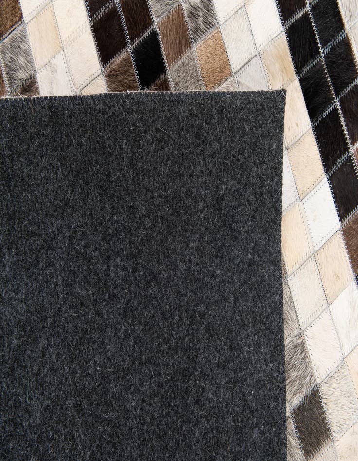 Detail image of  5' x 8' Cowhide Stocks Rug