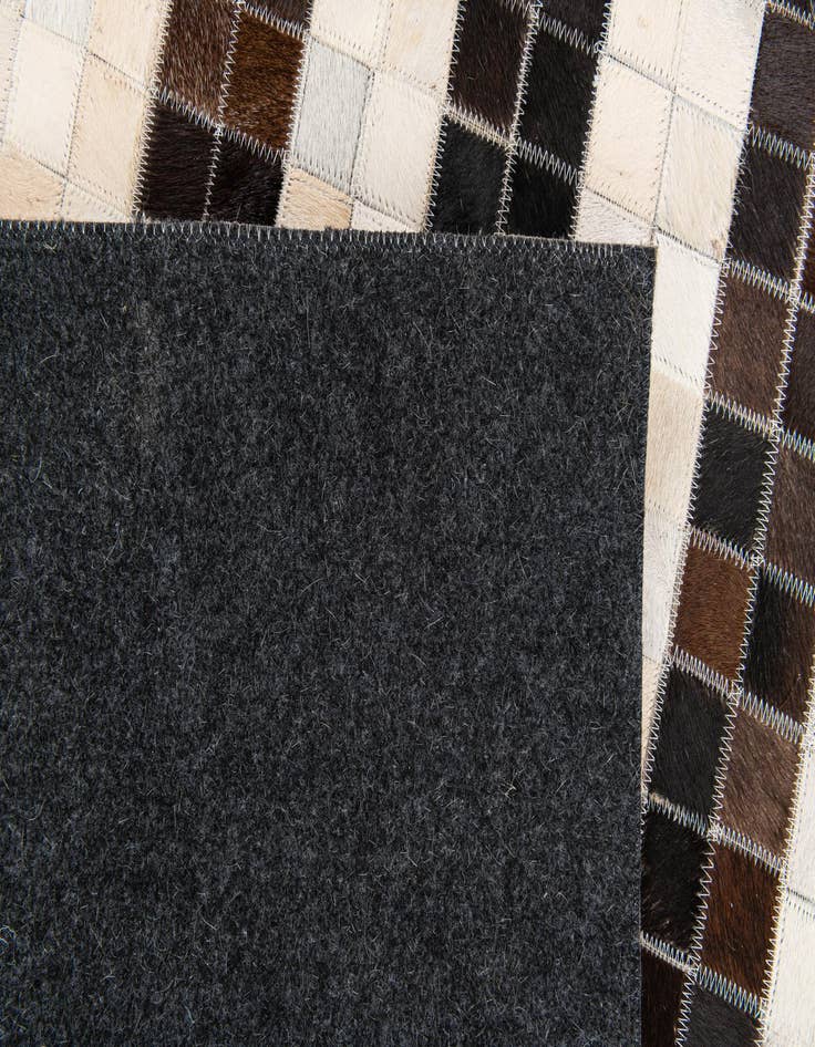 Detail image of  5' 1 x 7' 11 Cowhide Stocks Rug