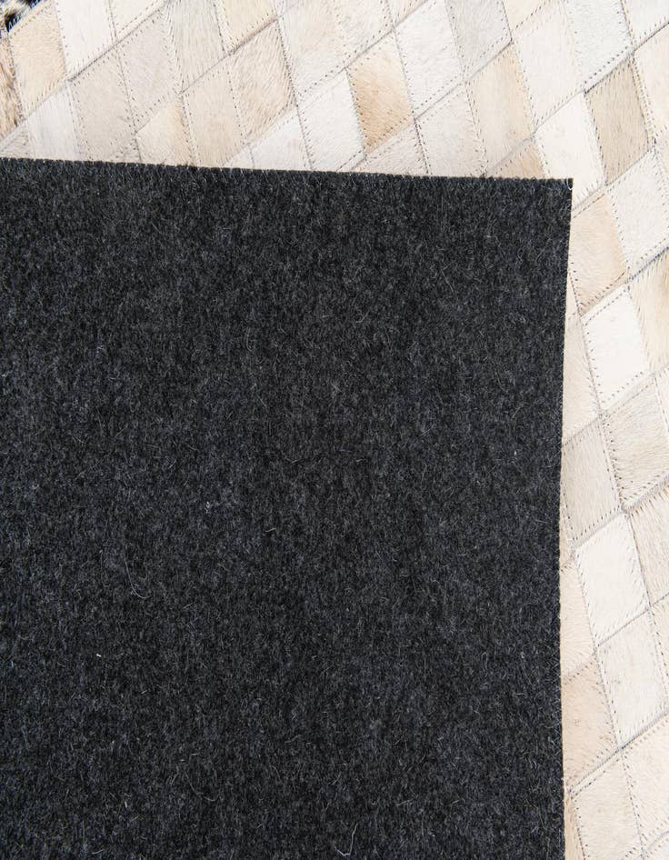 Detail image of  5' x 7' 10 Cowhide Stocks Rug