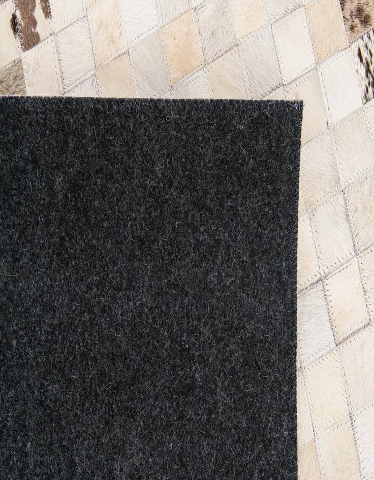 Detail image of  5' x 7' 11 Cowhide Stocks Rug