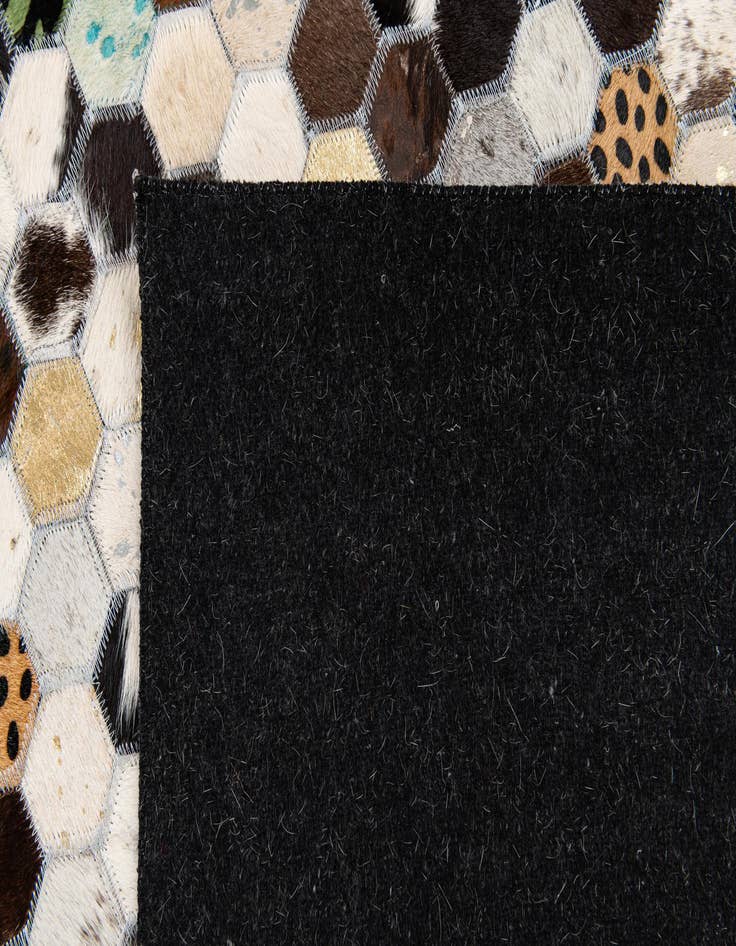 Detail image of  5' 1 x 8' Cowhide Stocks Rug