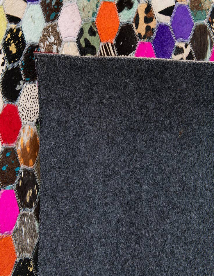 Detail image of  5' 1 x 7' 10 Cowhide Stocks Rug