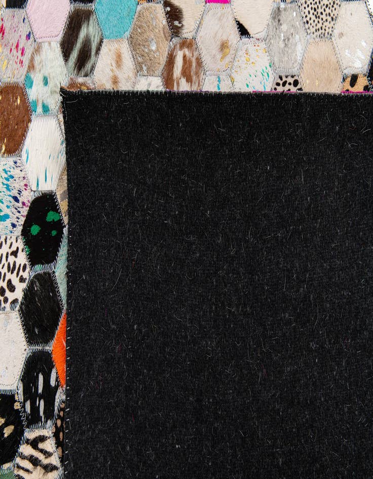 Detail image of  5' 1 x 7' 11 Cowhide Stocks Rug