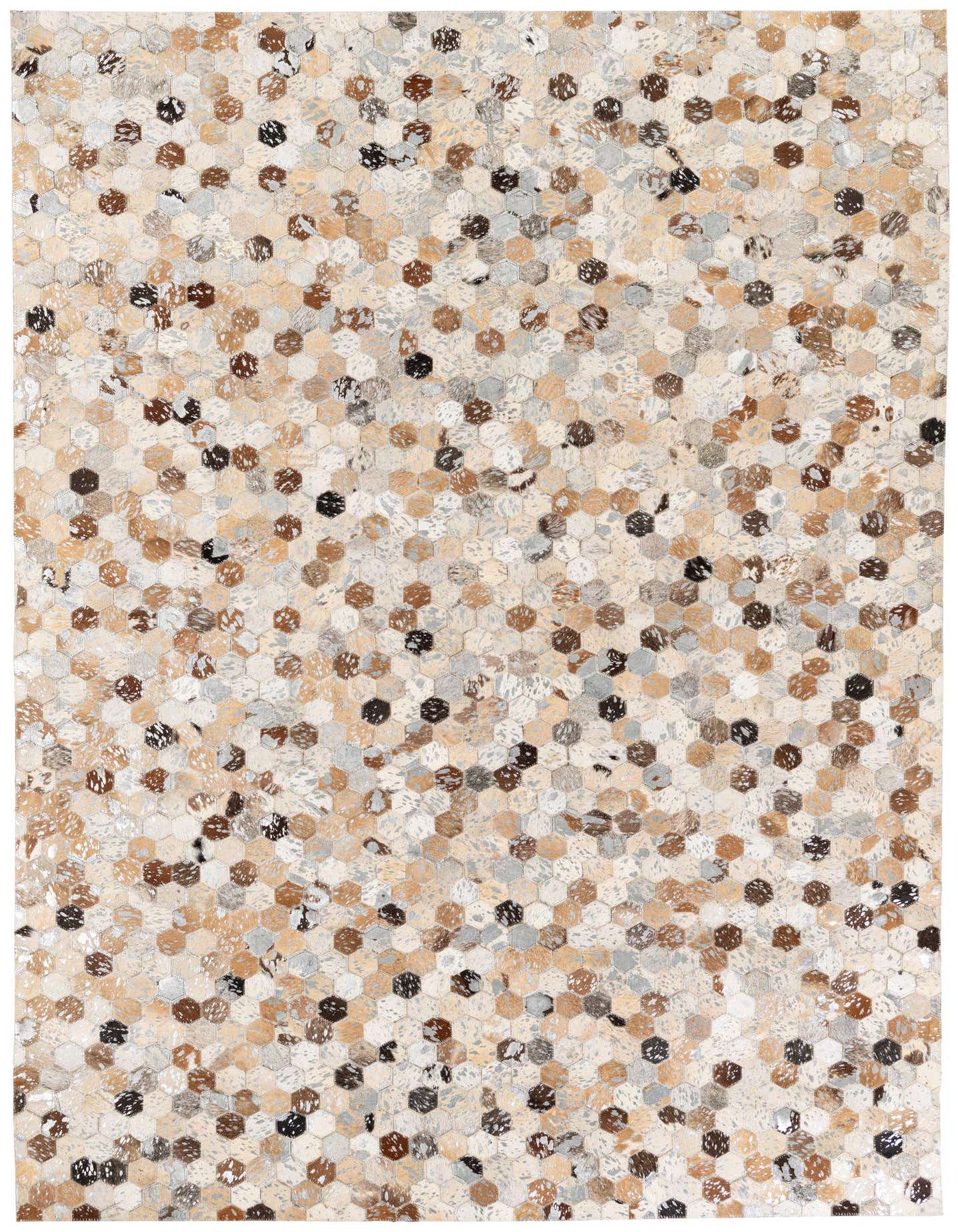 A rectangular 5x8 modern multi-colored cowhide rug with a mosaic of hexagonal patches in varying natural tones.