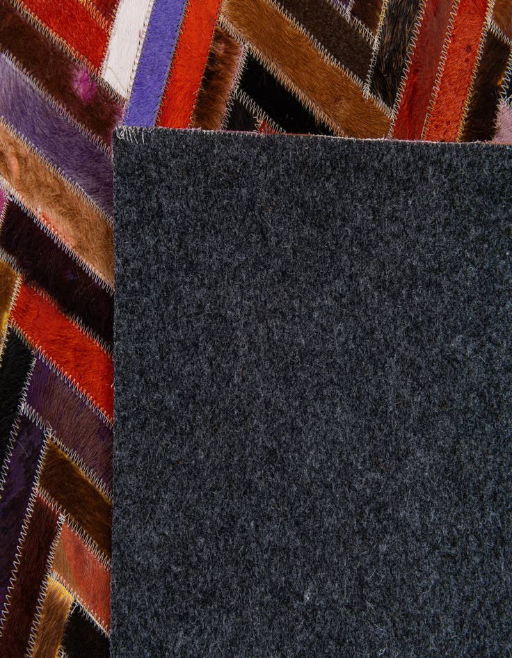 Detail image of  5' 5 x 7' 7 Cowhide Stocks Rug