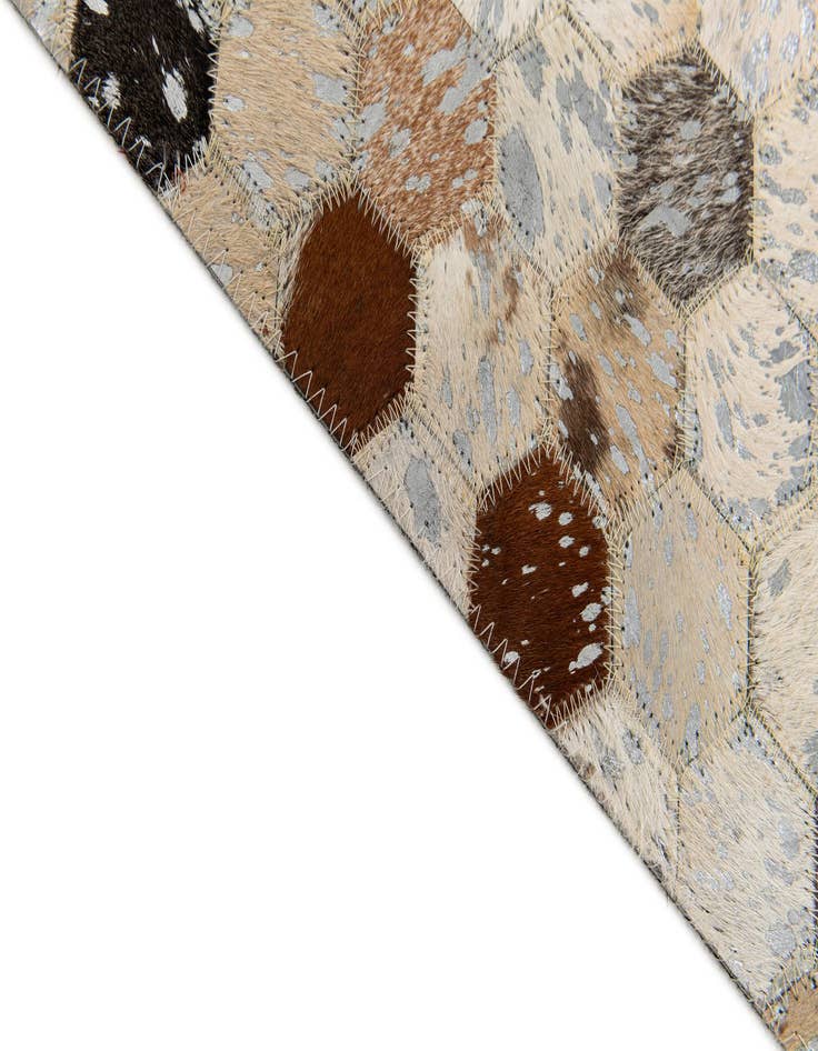 Detail image of  5' 3 x 7' 6 Cowhide Stocks Rug
