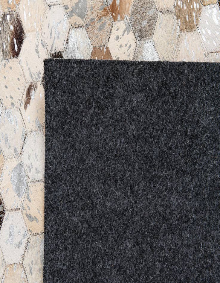 Detail image of  5' 4 x 7' 6 Cowhide Stocks Rug