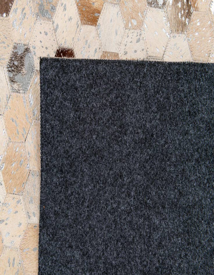 Detail image of  5' 4 x 7' 7 Cowhide Stocks Rug