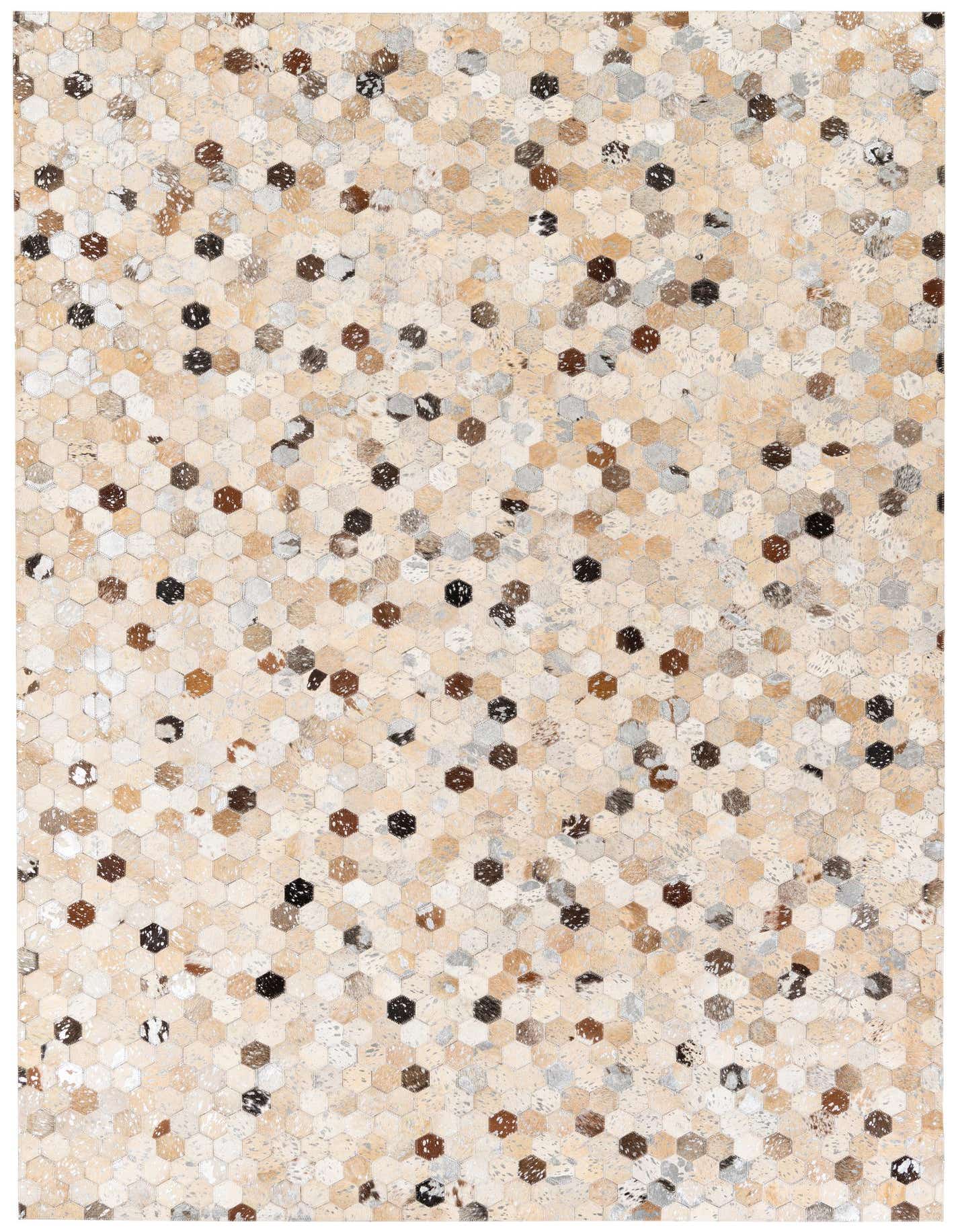 A 5x7 rectangular multi-colored modern cowhide rug with a mosaic of hexagonal patches in varying shades of beige, brown, black, and gray.