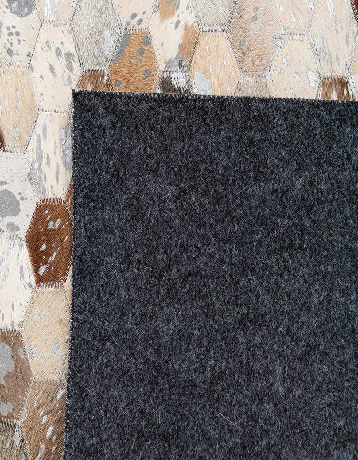 Detail image of  5' 4 x 7' 5 Cowhide Stocks Rug