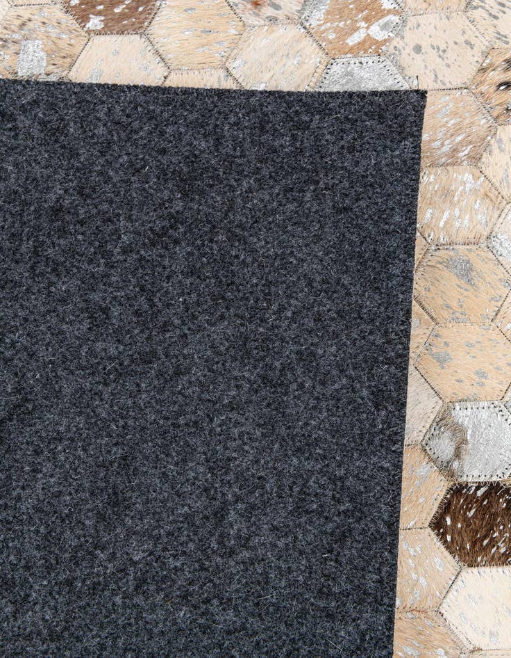 Detail image of  5' 4 x 7' 7 Cowhide Stocks Rug