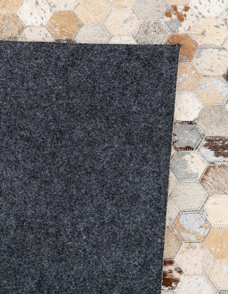 Detail image of  5' 3 x 7' 6 Cowhide Stocks Rug