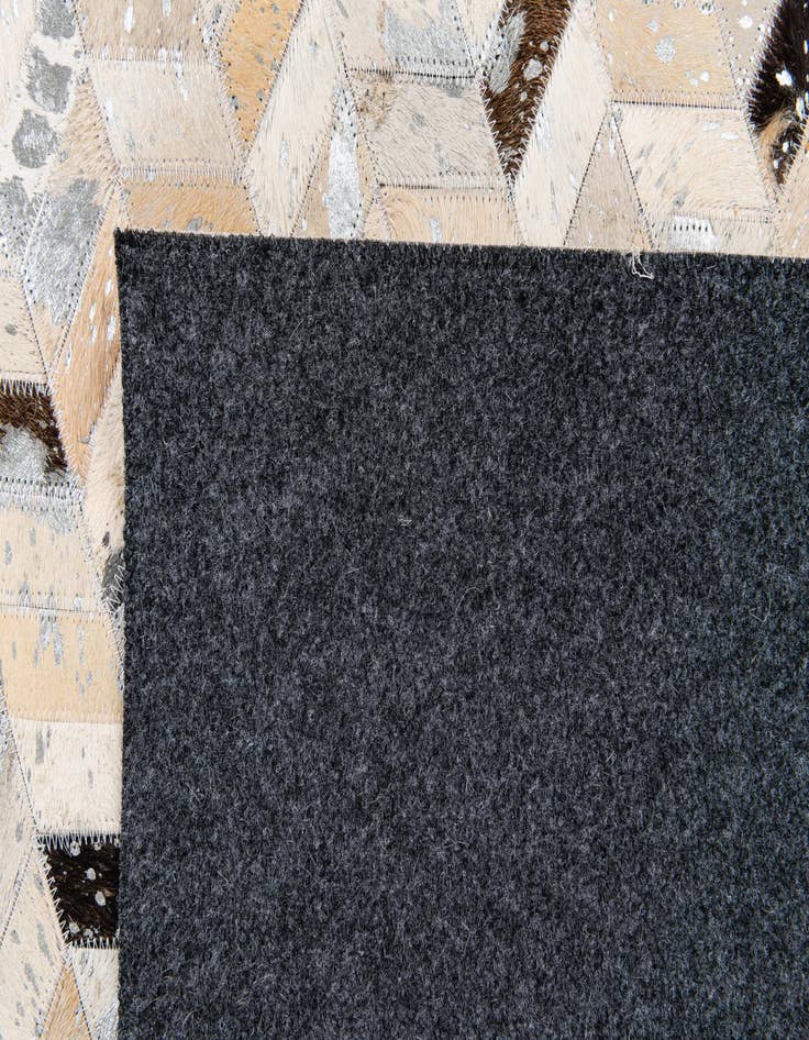 Detail image of  5' 1 x 8' 1 Cowhide Stocks Rug