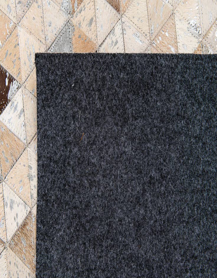 Detail image of  5' 4 x 7' 7 Cowhide Stocks Rug