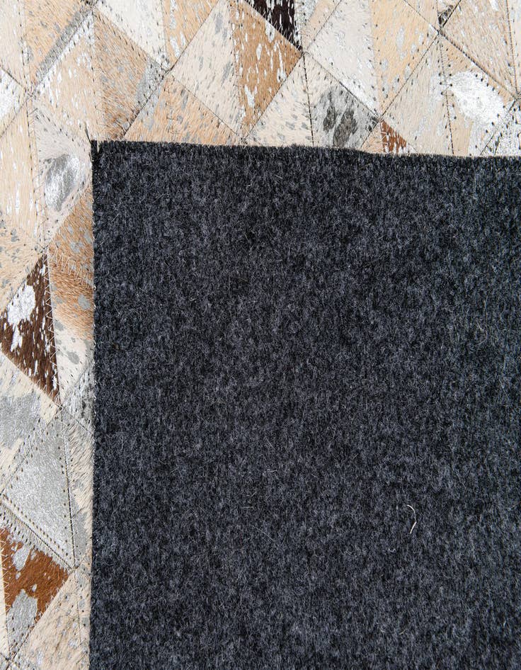 Detail image of  5' 3 x 7' 6 Cowhide Stocks Rug