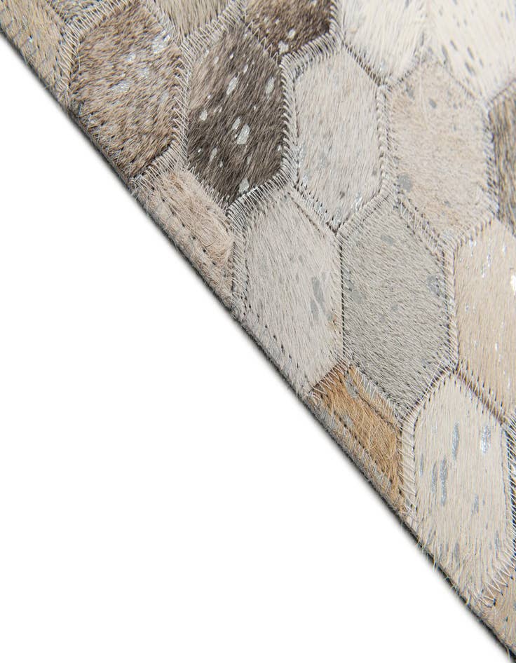 Detail image of  4' 11 x 7' 11 Cowhide Stocks Rug