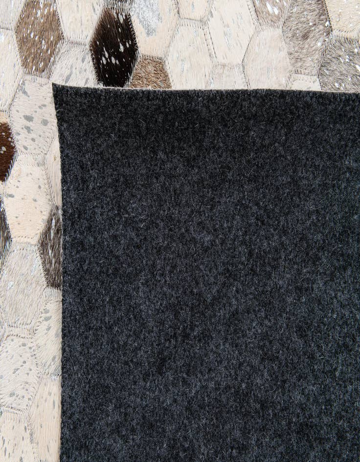 Detail image of  4' 11 x 7' 11 Cowhide Stocks Rug