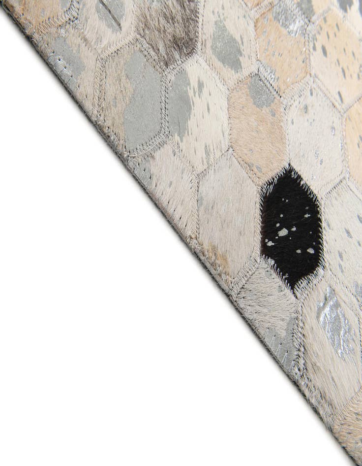 Detail image of  5' 1 x 8' Cowhide Stocks Rug