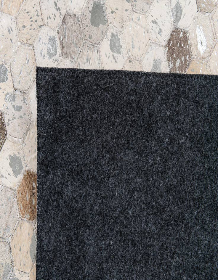 Detail image of  5' 1 x 8' Cowhide Stocks Rug