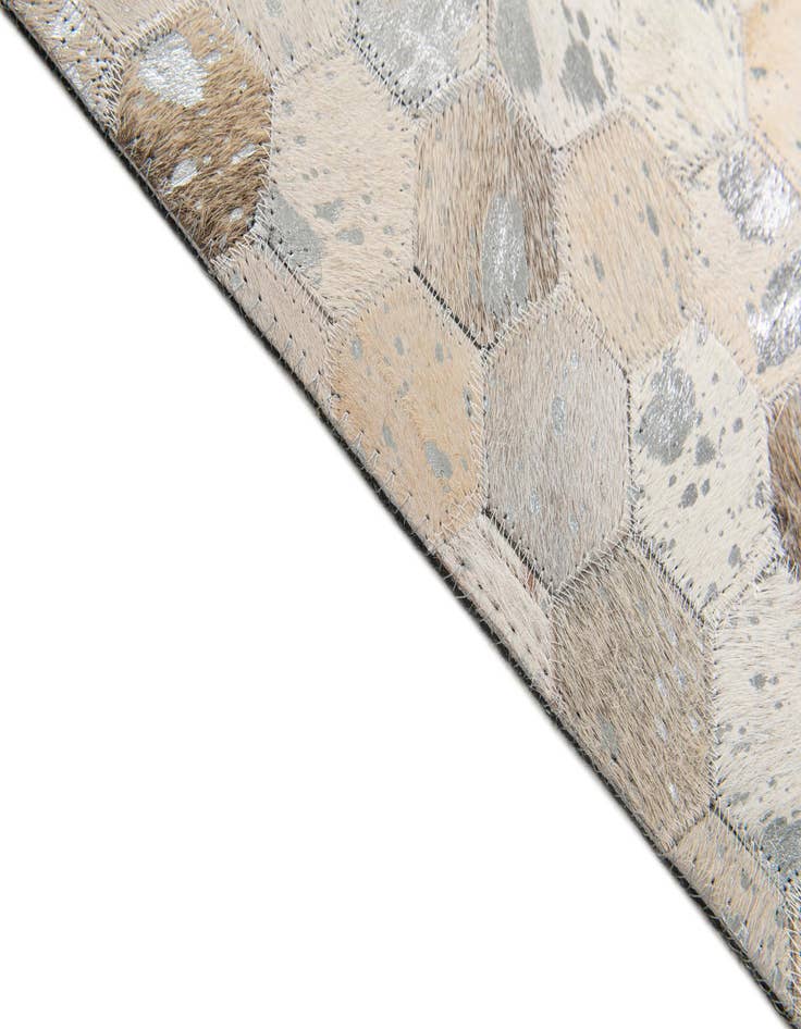 Detail image of  5' 1 x 8' Cowhide Stocks Rug