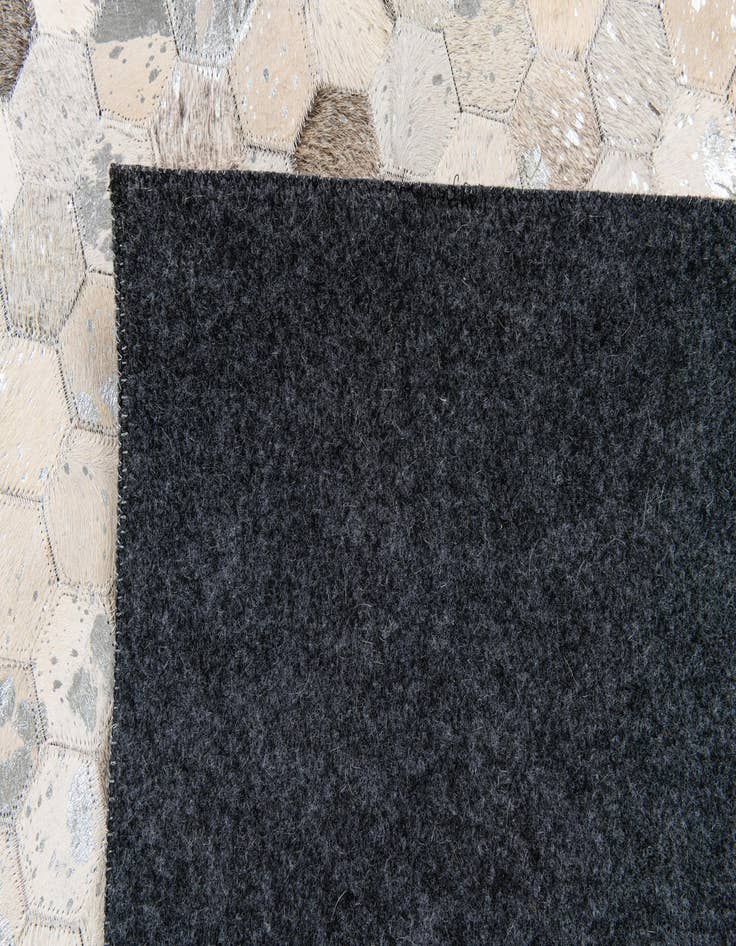 Detail image of  5' 1 x 8' Cowhide Stocks Rug