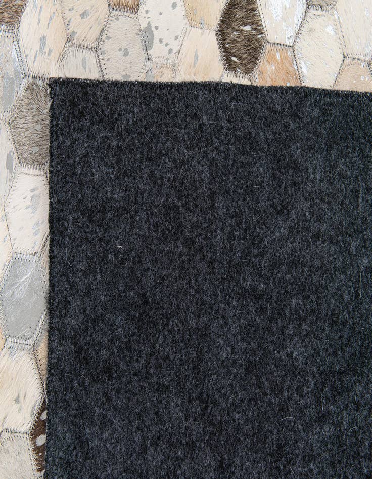 Detail image of  5' 1 x 7' 11 Cowhide Stocks Rug