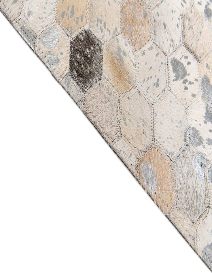 Detail image of  5' 1 x 8' Cowhide Stocks Rug