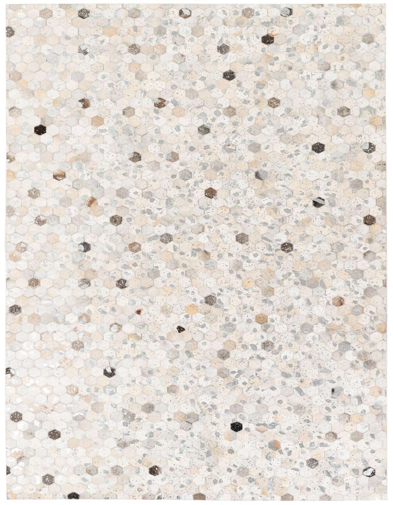 A 5x8 rectangular Cowhide Stocks rug featuring a modern multi-colored hexagonal pattern in neutral tones with darker accents.