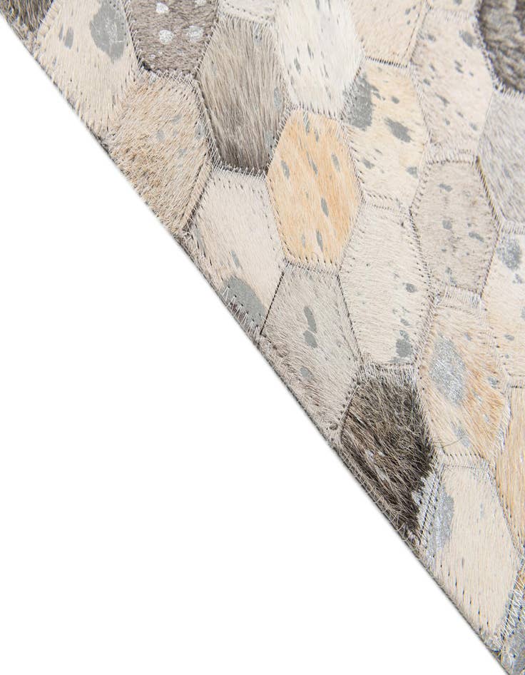 Detail image of  5' 1 x 8' 2 Cowhide Stocks Rug