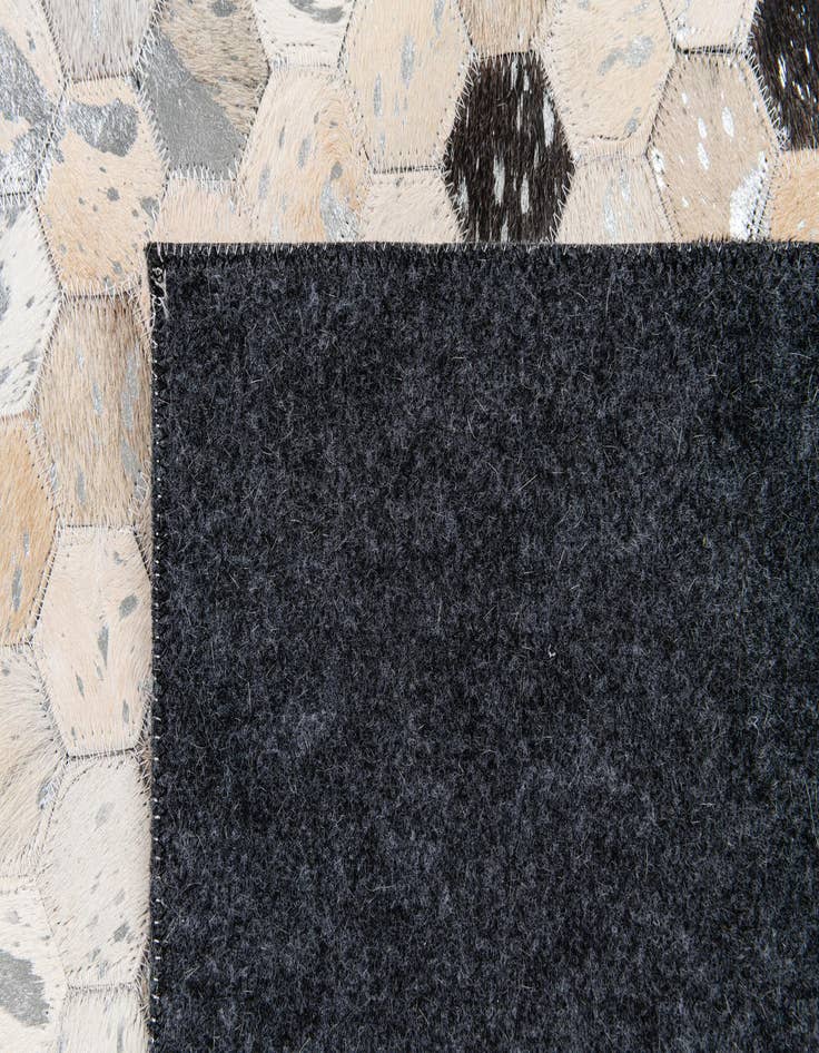 Detail image of  5' x 8' Cowhide Stocks Rug