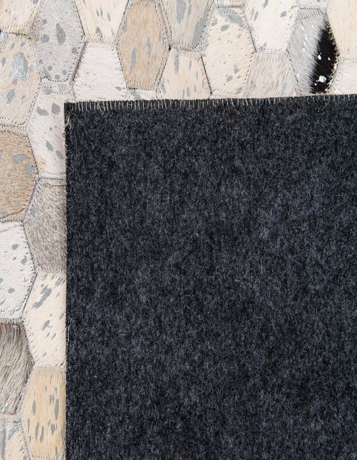 Detail image of  5' x 8' Cowhide Stocks Rug