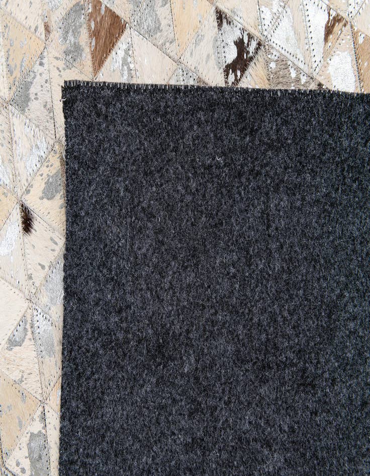 Detail image of  5' 4 x 7' 5 Cowhide Stocks Rug