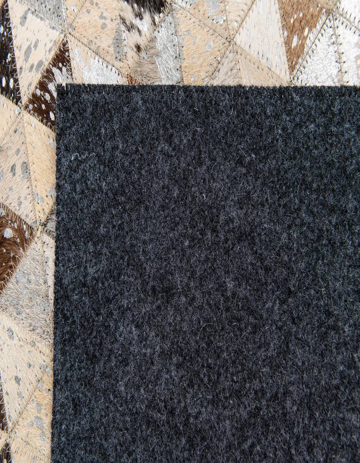 Detail image of  5' 4 x 7' 6 Cowhide Stocks Rug