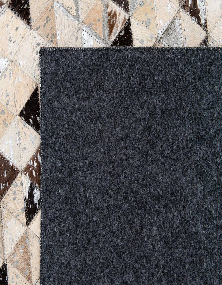 Detail image of  5' 2 x 7' 7 Cowhide Stocks Rug