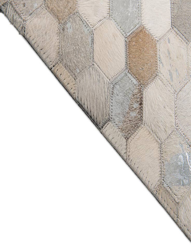 Detail image of  5' x 7' 11 Cowhide Stocks Rug