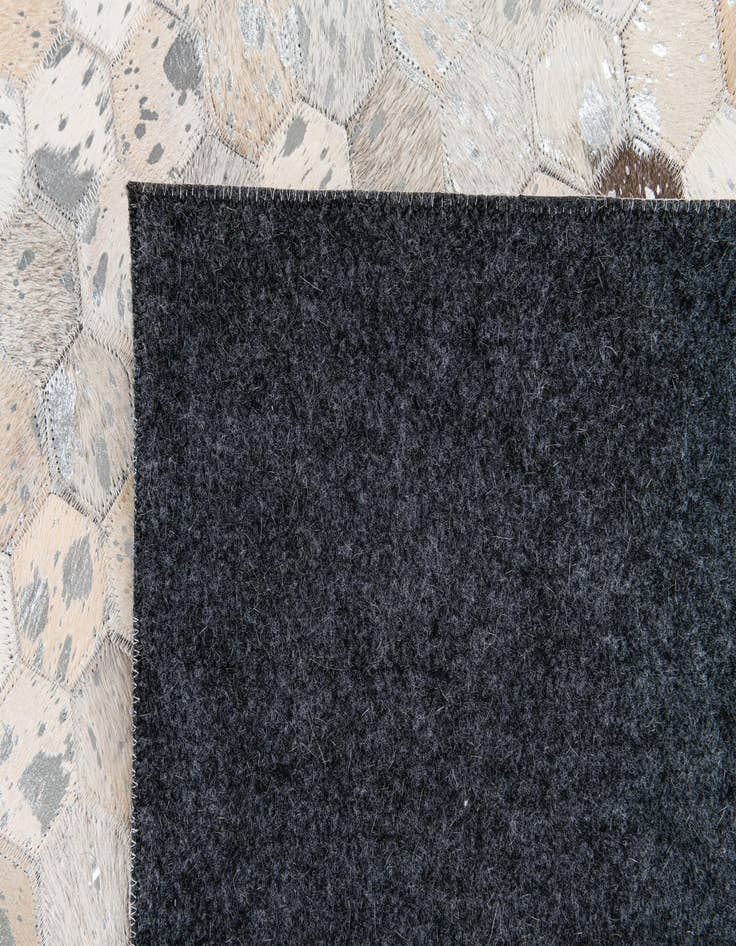 Detail image of  5' 1 x 8' Cowhide Stocks Rug