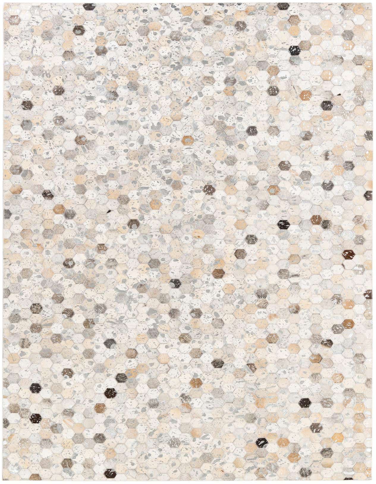 A 5x8 rectangular Cowhide Stocks rug featuring a multi-colored patchwork geometric pattern of hexagonal cowhide pieces in various natural tones.