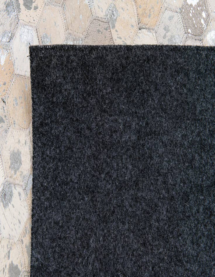 Detail image of  5' 1 x 8' 1 Cowhide Stocks Rug