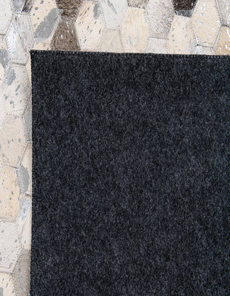 Detail image of  5' x 8' Cowhide Stocks Rug