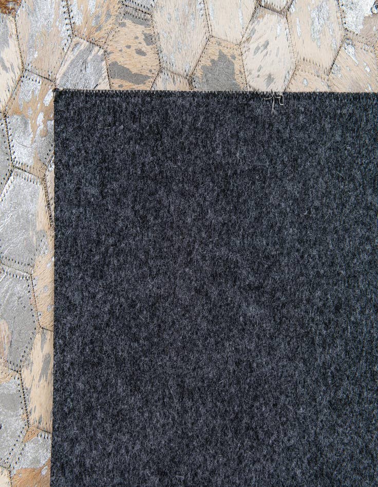 Detail image of  5' 5 x 7' 8 Cowhide Stocks Rug