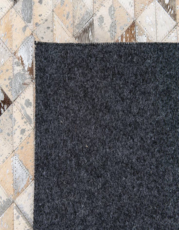 Detail image of  5' 2 x 7' 7 Cowhide Stocks Rug