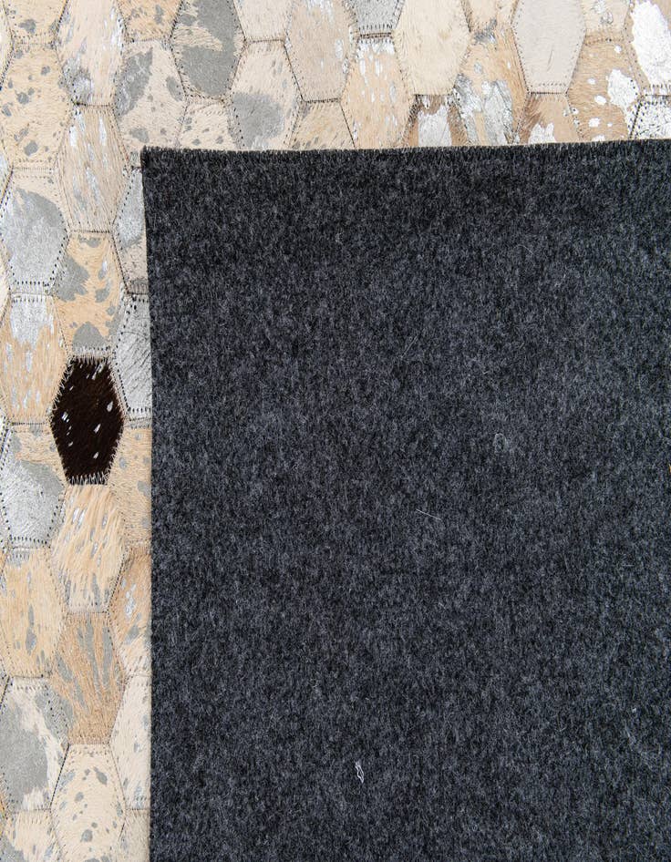 Detail image of  5' 4 x 7' 7 Cowhide Stocks Rug