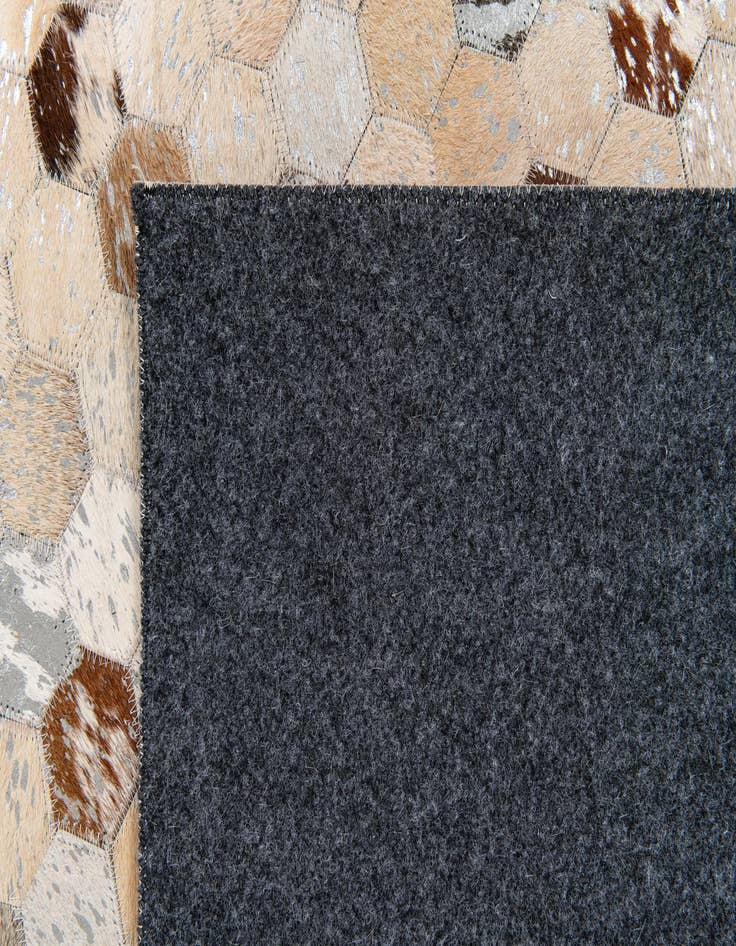 Detail image of  5' 4 x 7' 7 Cowhide Stocks Rug