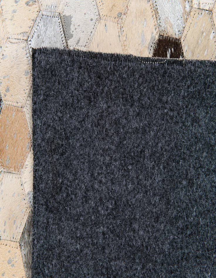 Detail image of  5' 6 x 7' 8 Cowhide Stocks Rug