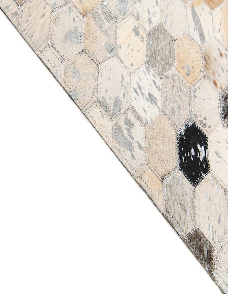 Detail image of  5' x 7' 9 Cowhide Stocks Rug