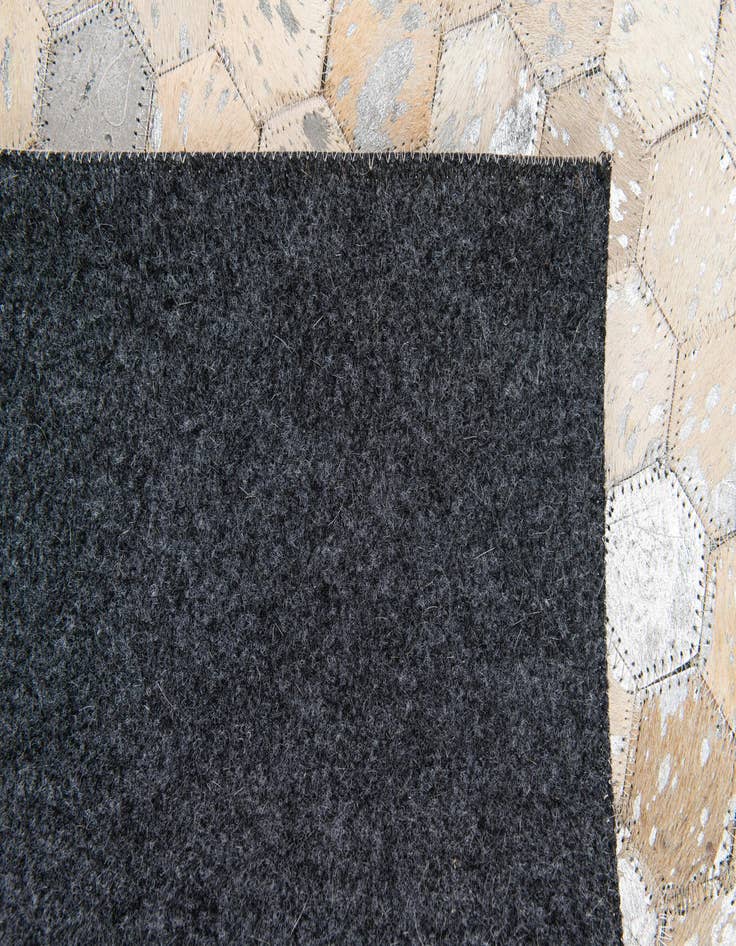 Detail image of  5' 3 x 7' 7 Cowhide Stocks Rug