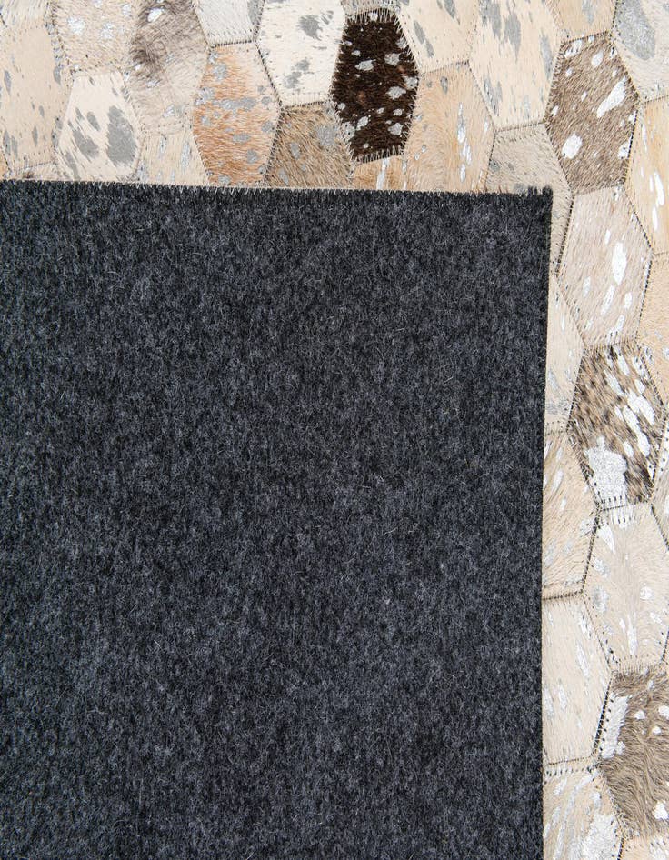 Detail image of  5' 2 x 7' 6 Cowhide Stocks Rug